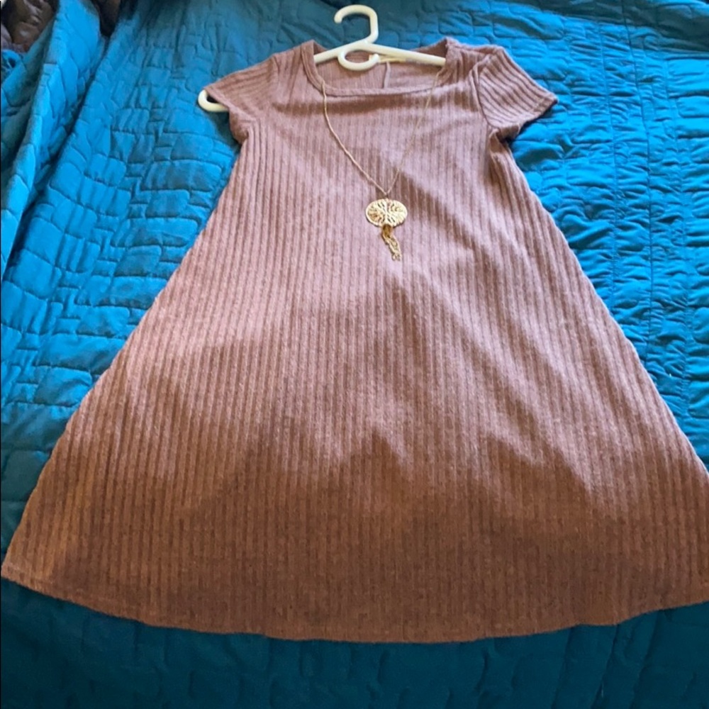 Brown dress with medallion